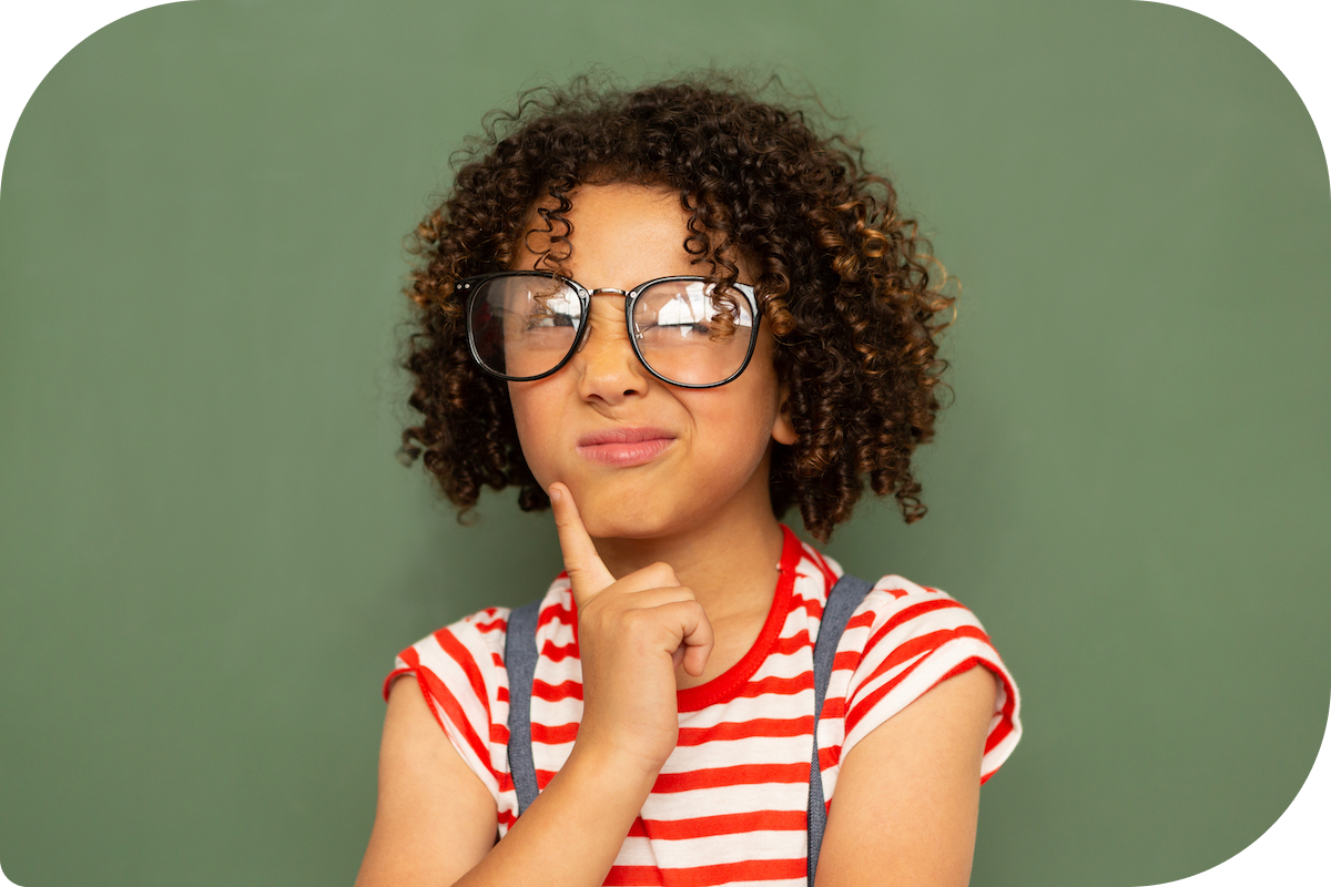 thoughtful-schoolgirl-standing-against-a-green-boa-2021-08-28-16-44-10-utc
